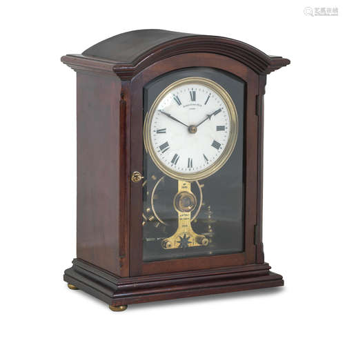 An early 20th century mahogany electric mantel clock The dial inscribed Eureka Clock Co. Ltd, London and numbered 7633