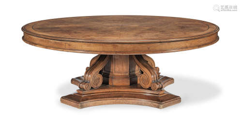 A large mid-19th century oak, pollard oak and ebony line inlaid circular extending dining table