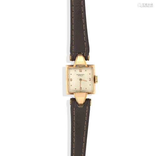 International Watch Company. An 18k gold ladies manual wind wristwatch