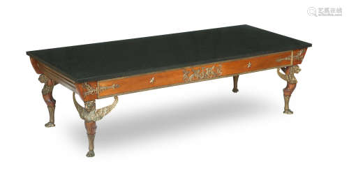 A mahogany Empire Revival style granite top coffee table, 20th Century