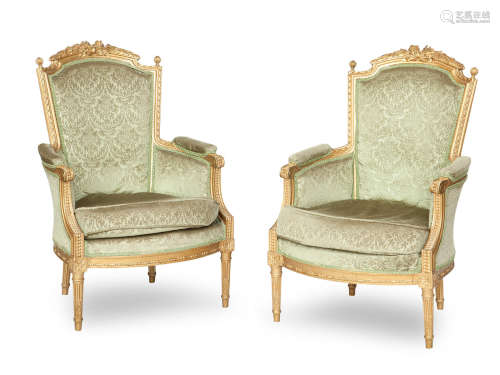 A pair of late 19th/early 20th century gilt framed fauteuil