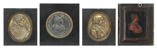 A collection of portrait bust reliefs and medallions
