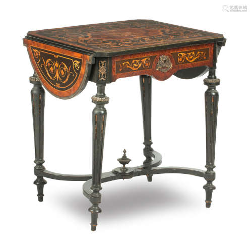 A late 19th/early 20th century French walnut, marquetry inlaid and gilt metal mounted writing table