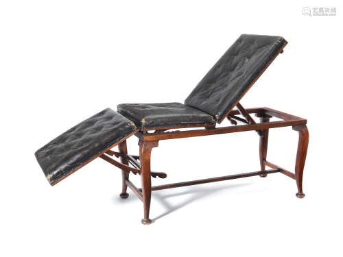 An early 20th century walnut consultation reclining bed By W.H. Bailey & Son
