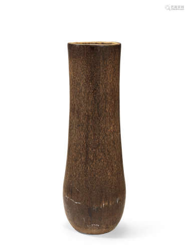 A massive palm wood vase or planter