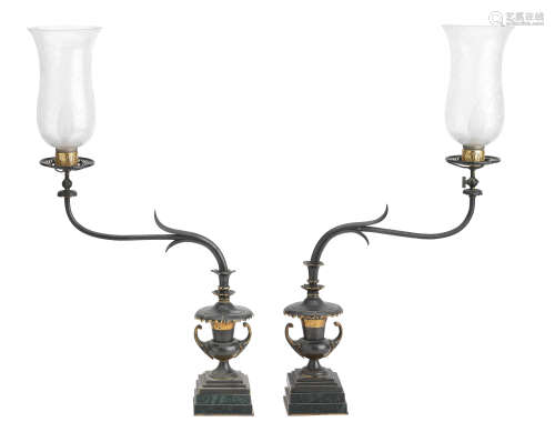 An unusual pair of Arts & Crafts bronze gas lamps, circa 1900