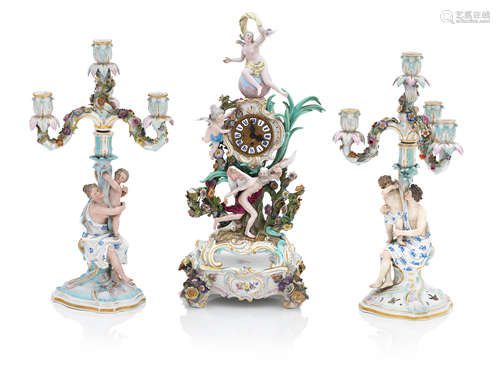 A Meissen clock on stand and two candelabra Late 19th century