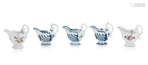 Four Derby porcelain dolphin ewer creamboats and a Worcester example Late 18th century