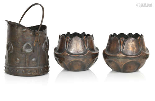 An Arts and Crafts coal scuttle with a pair of Secessionist planters