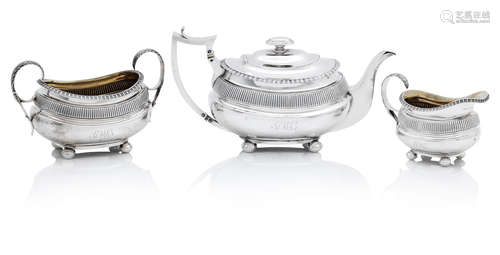 A George III three piece Scottish silver tea service by John Mckay, Edinburgh 1814