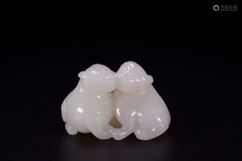 A Chinese Carved Hetian Jade Beast Ornament