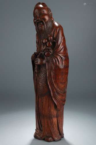 A Chinese Carved Bamboo Dongfang Shuo Ornament