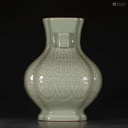 A Chinese Pea Green Glazed Carved Porcelain Vase