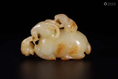 A Chinese Carved Hetian Jade Sheep Ornament