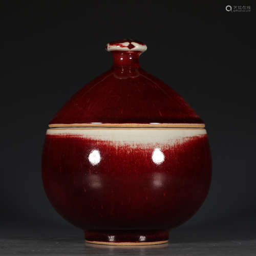 A Chinese Red Glazed Porcelain Jar With Cover