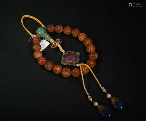 A Chinese Carved Bodhi Beads Hand String