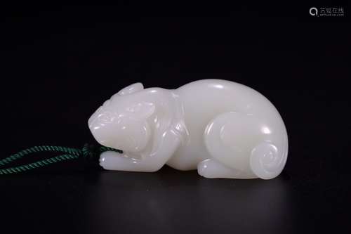 A Chinese Carved Hetian Jade Beast Ornament