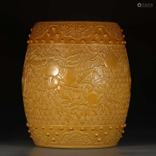 A Chinese Yellow Glazed Peach Piercing Porcelain Drum Shaped Stool