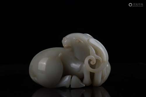 A Chinese Carved Hetian Jade Sheep Ornament