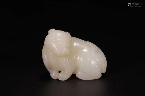 A Chinese Carved Hetian Jade Beast Ornament