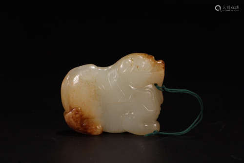 A Chinese Carved Hetian Jade Beast Ornament