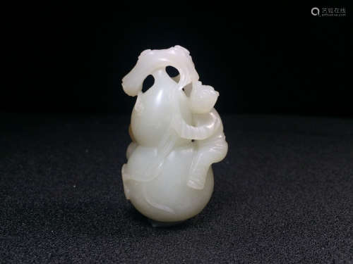 A Chinese Carved Hetian Jade Boy Gourd Ornament
