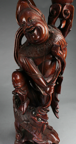 A Carved Wooden Statue