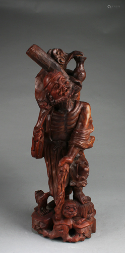 A Carved Wooden Statue