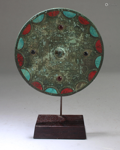 A Bronze Mirror with Red and Blue Turquoi…