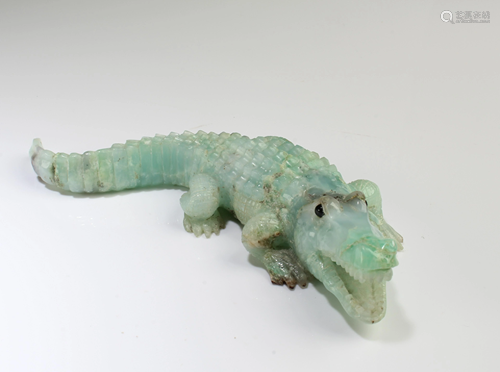 A Carved Stone Crocodile Figurine