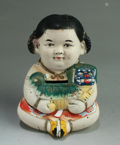 An Old Clay Doll
