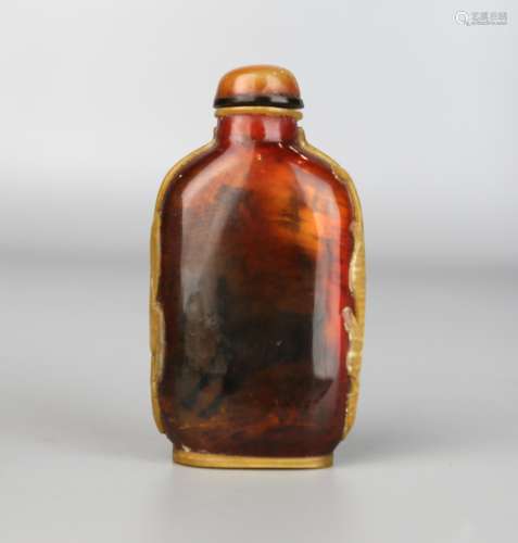 A Chinese Snuff Bottle Made from Red Crane Crest,