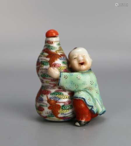 A Chinese Famille Rose Snuff Bottle in Shape of Boy