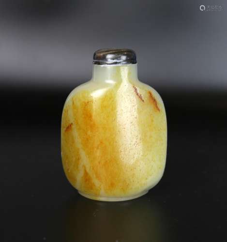 A Chinese Yellow Jade Russet Snuff Bottle, Pebble