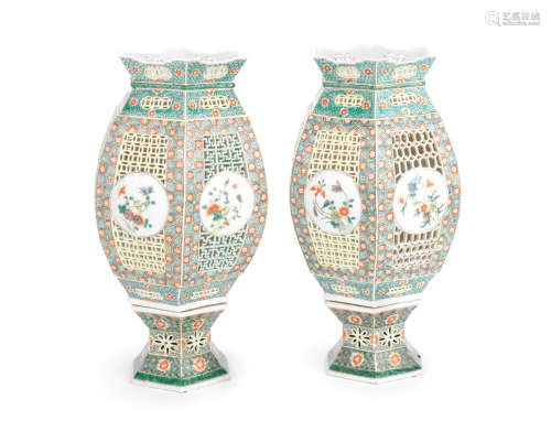 A pair of famille verte pierced lanterns and stands 19th century