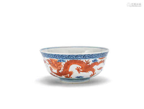 A blue and white, iron red and green enamelled 'dragon' bowl, Cai hua tang zhi iron red mark, 19th century