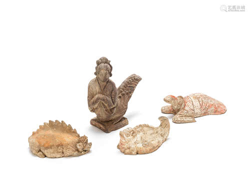 Three painted pottery models of stylised animals and a grey pottery apsara Tang Dynasty and possibly later