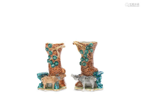 A matched pair of polychrome 'water buffalo and pine' spill vases Qianlong