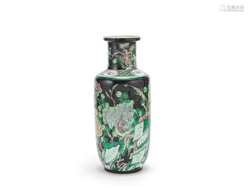 A black-ground famille verte rouleau vase Kangxi six-character mark, Late Qing Dynasty