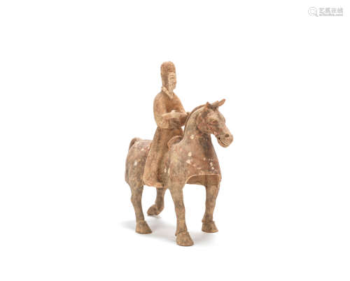 A large painted pottery model of an equestrian Sixteen Kingdoms