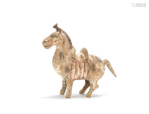 A painted grey pottery model of a Mongolian pony Western Jin Dynasty