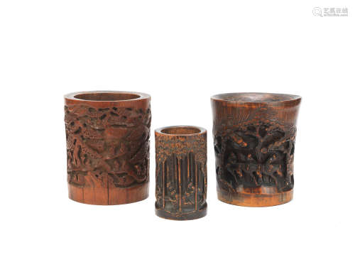 Three carved bamboo brush pots Late Qing Dynasty
