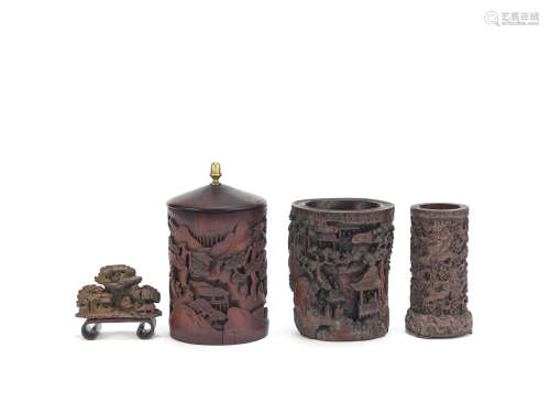 Three carved brushpots and a bamboo brushrest 19th/20th century