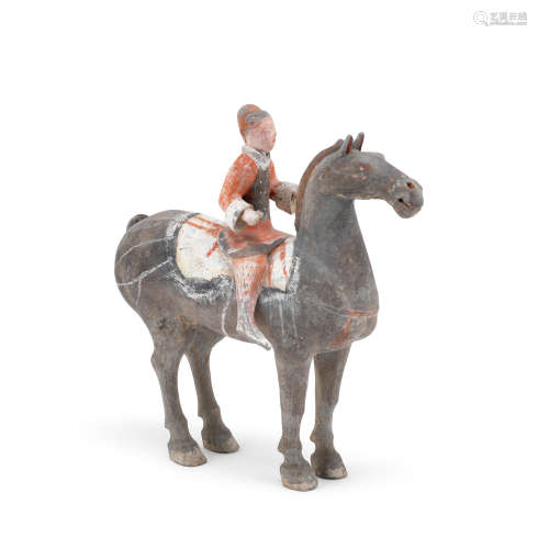 A painted grey pottery equestrian Han Dynasty