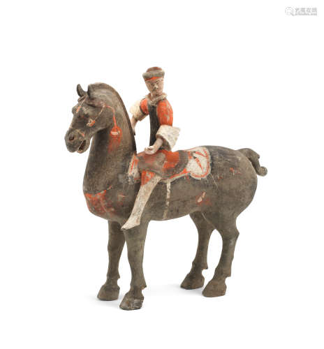 A painted grey pottery equestrian Han Dynasty