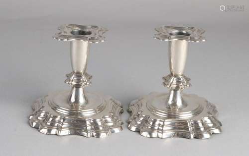 2 silver candlesticks