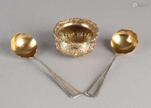 Set with 2 silver spoons and a bowl