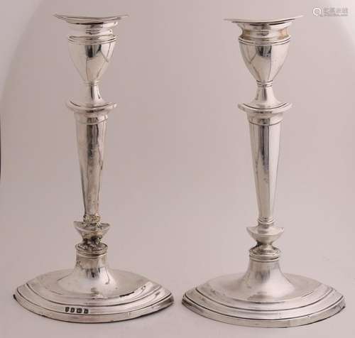 Pair of silver candlesticks