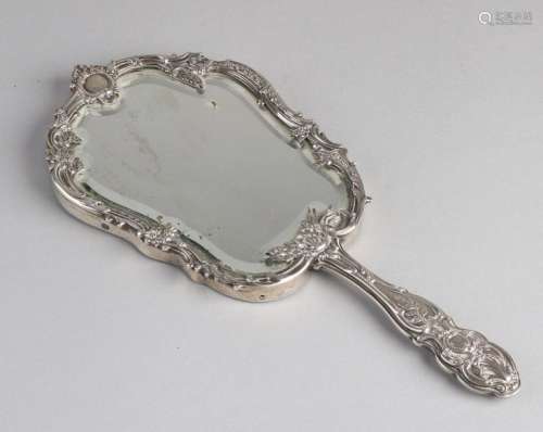 Hand mirror with silver frame