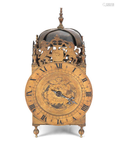 A late 19th century / early 20th century brass lantern clock in the 17th century style, the dial signed Thomas Wheeler
